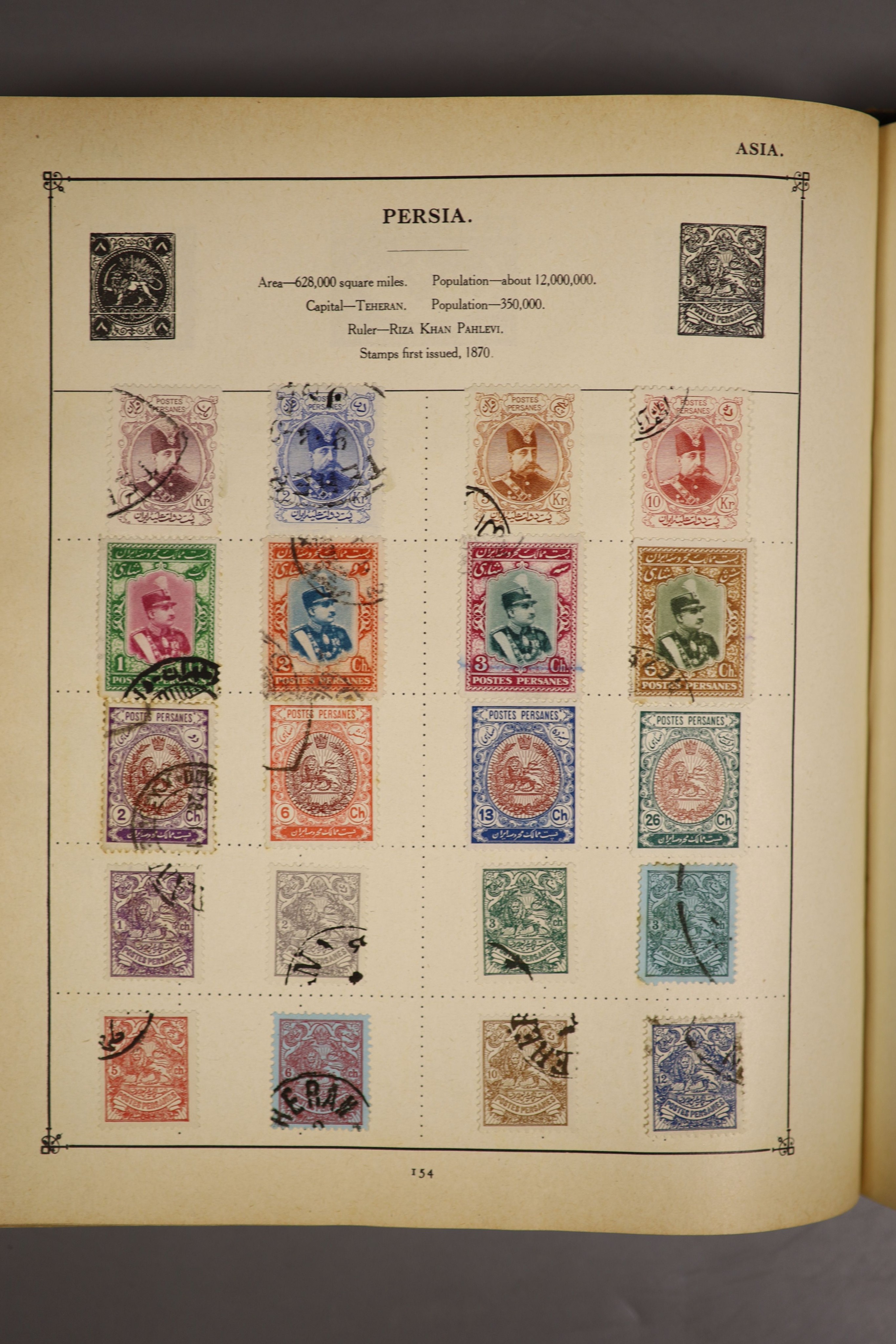 A Strand album of world stamps, 19th/20th century, started in 1931 including some unused stamps